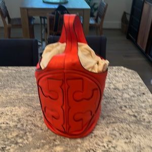 Large orange Tory Burch bucket leather bag